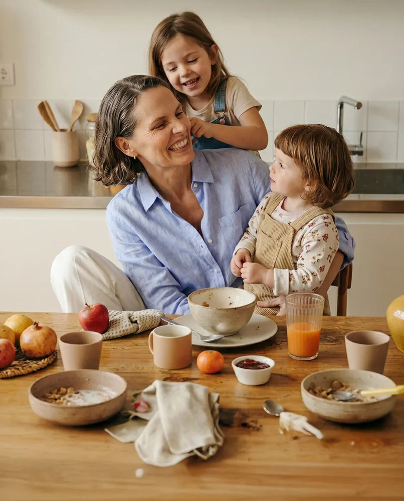 Family sharing breakfast after a restful night’s sleep